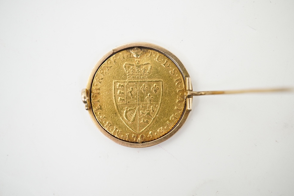 British gold coins, George III, gold guinea, 1794, in a swivel mount, plug at 12 o’clock position, otherwise good